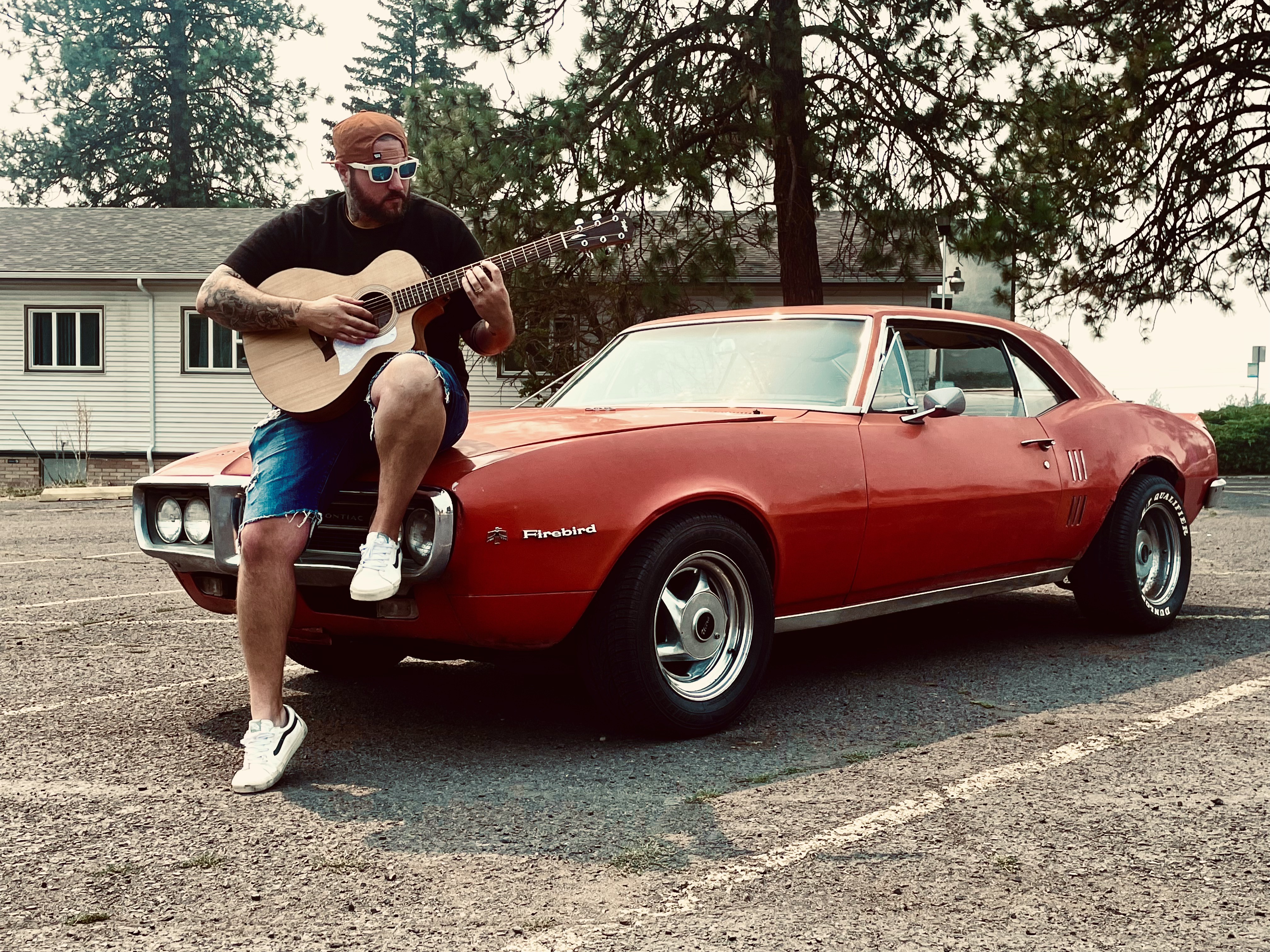 Cody P. on a classic red Firebird with acoustic guitar